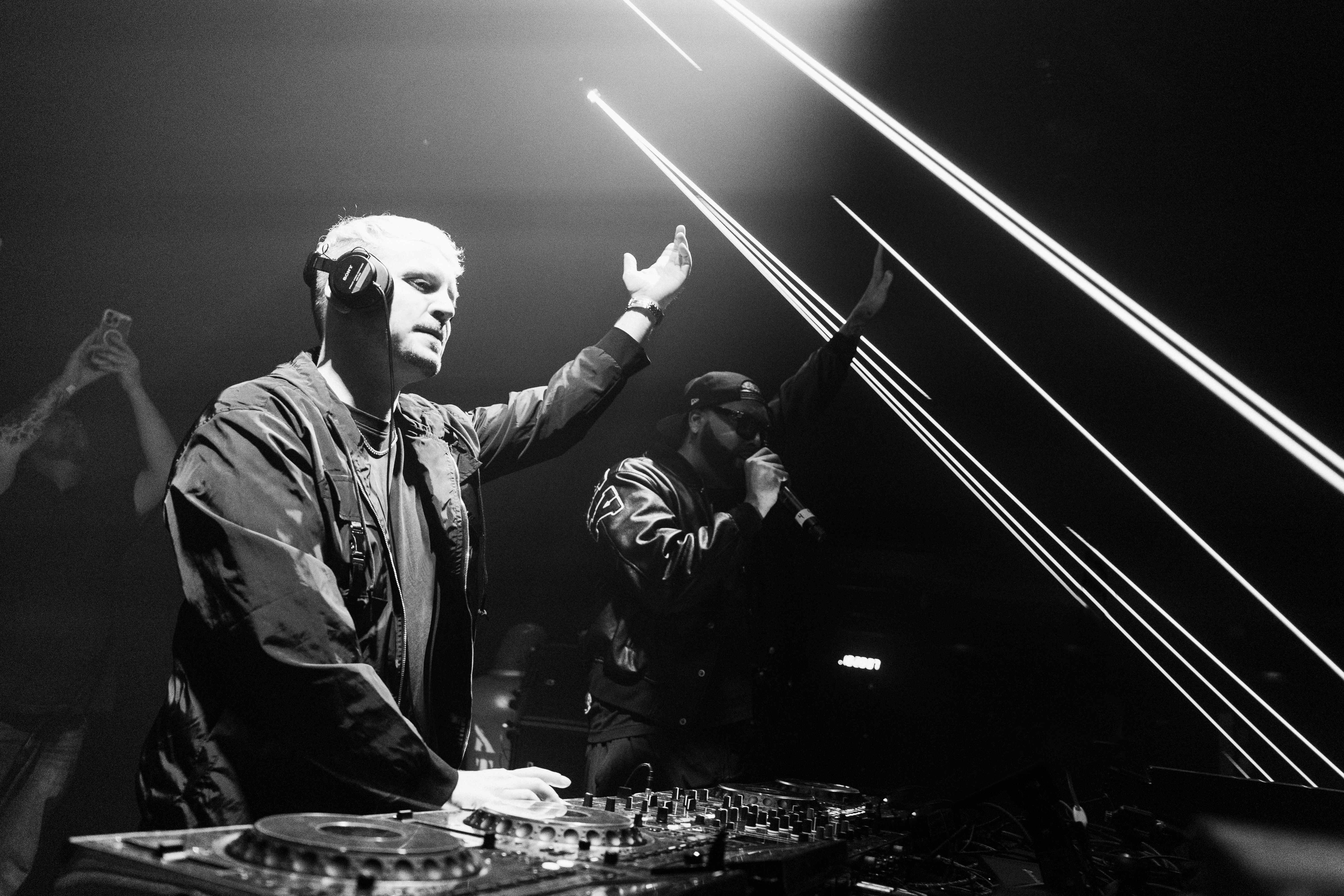 Black and white photo of Red Cup Nation DJing