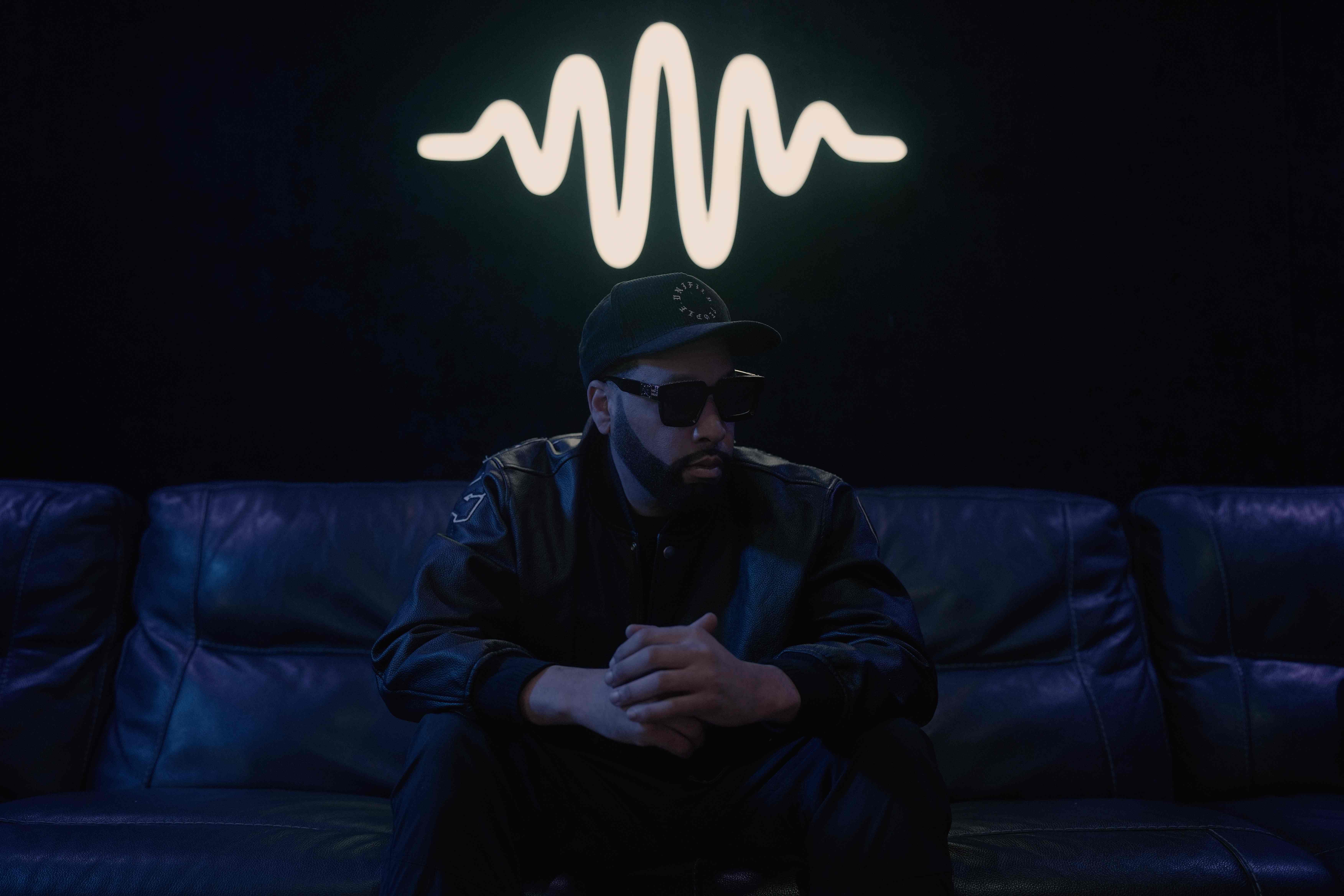 Studio session with sound wave logo